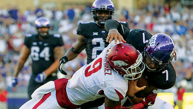 Razorback Santos Ramirez tackles Kenny Hill at TCU in 2016.